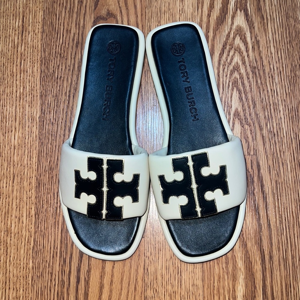 Double T sport slide Tory Burch never worn. Comes with box